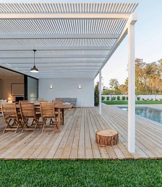 Modern villa with pool and deck with interior view